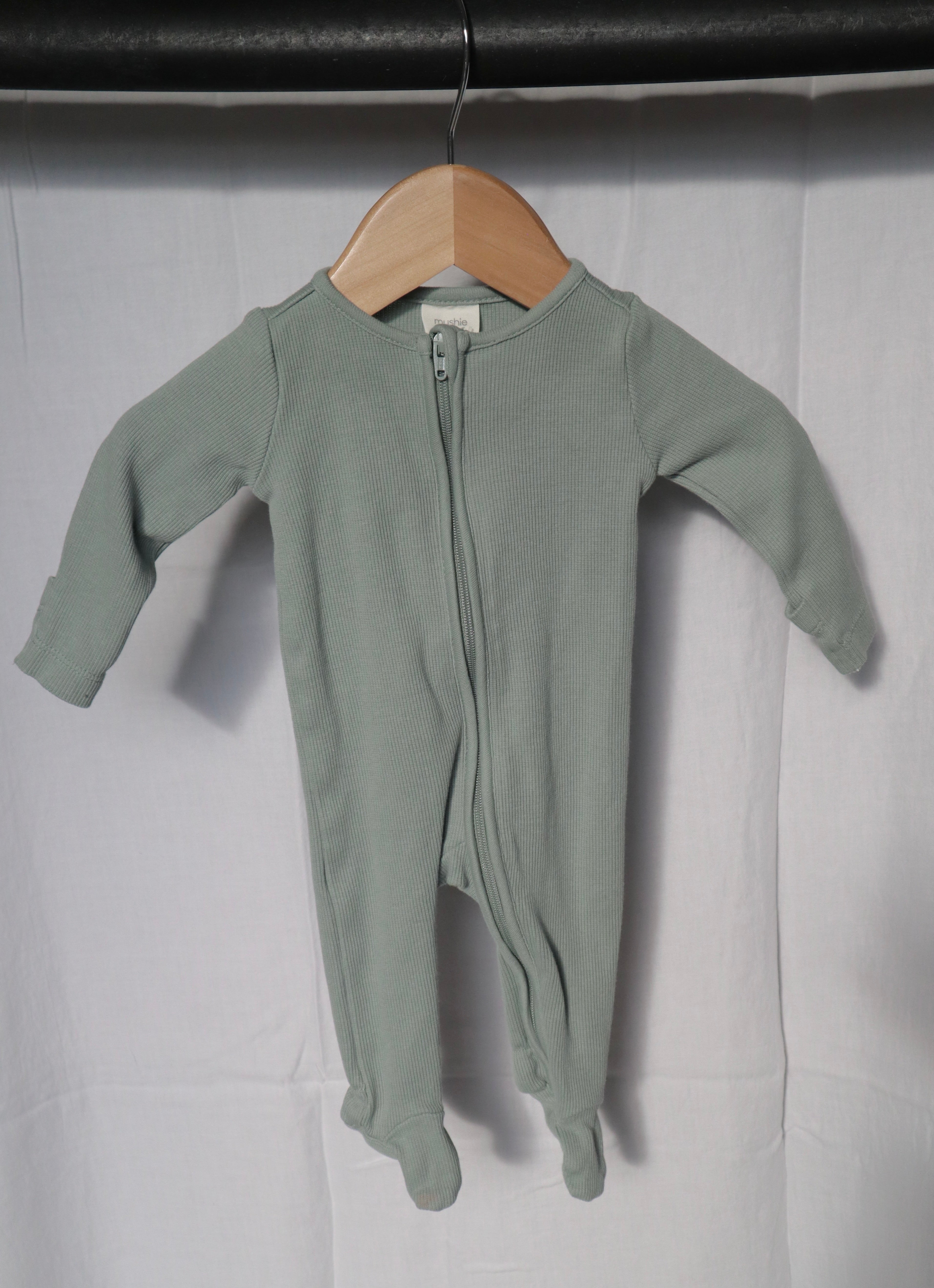Mushie Sage Green Ribbed Organic Cotton Zippered Footed Sleeper – 0-3 Months